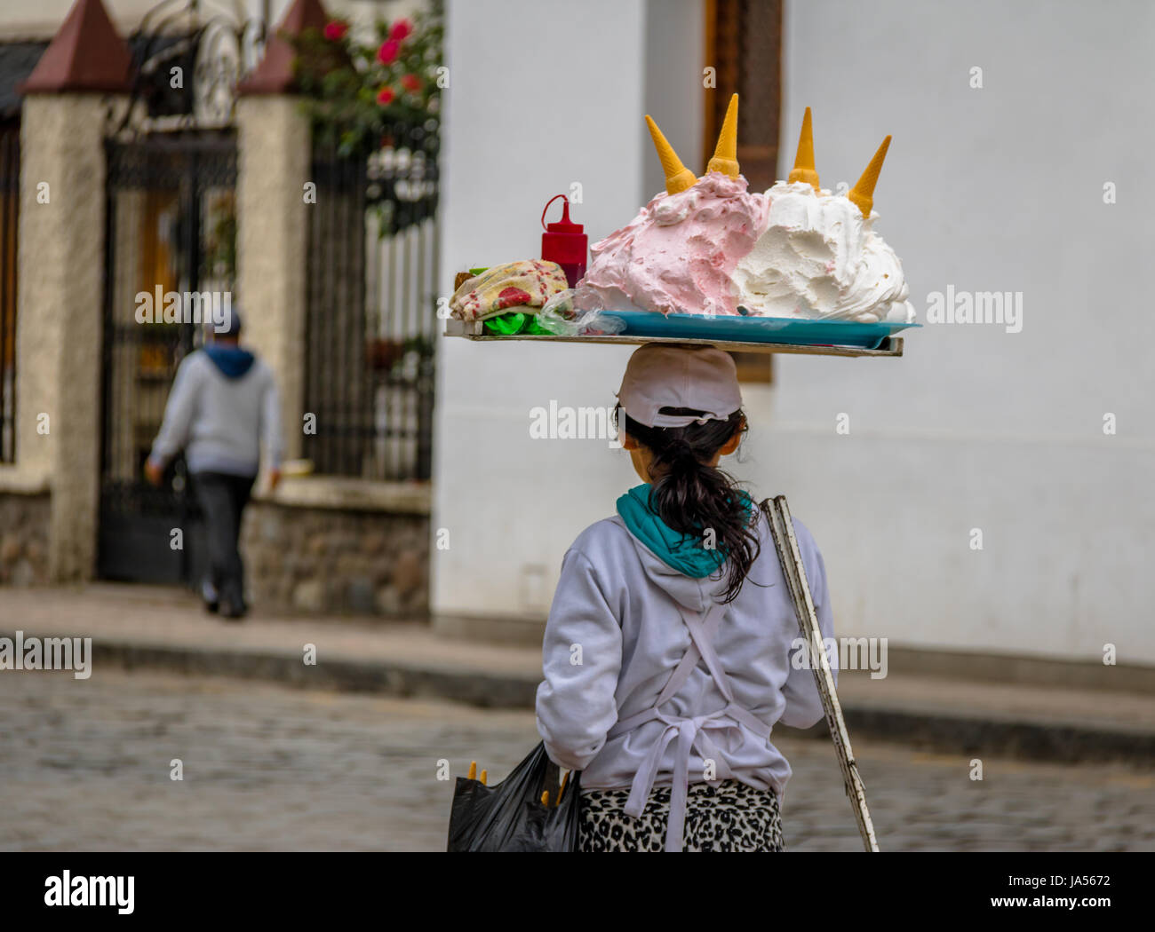 Typical Espumilla (meringue like dessert on ice cream cone) street vendor - Cuenca, Ecuador Stock Photo