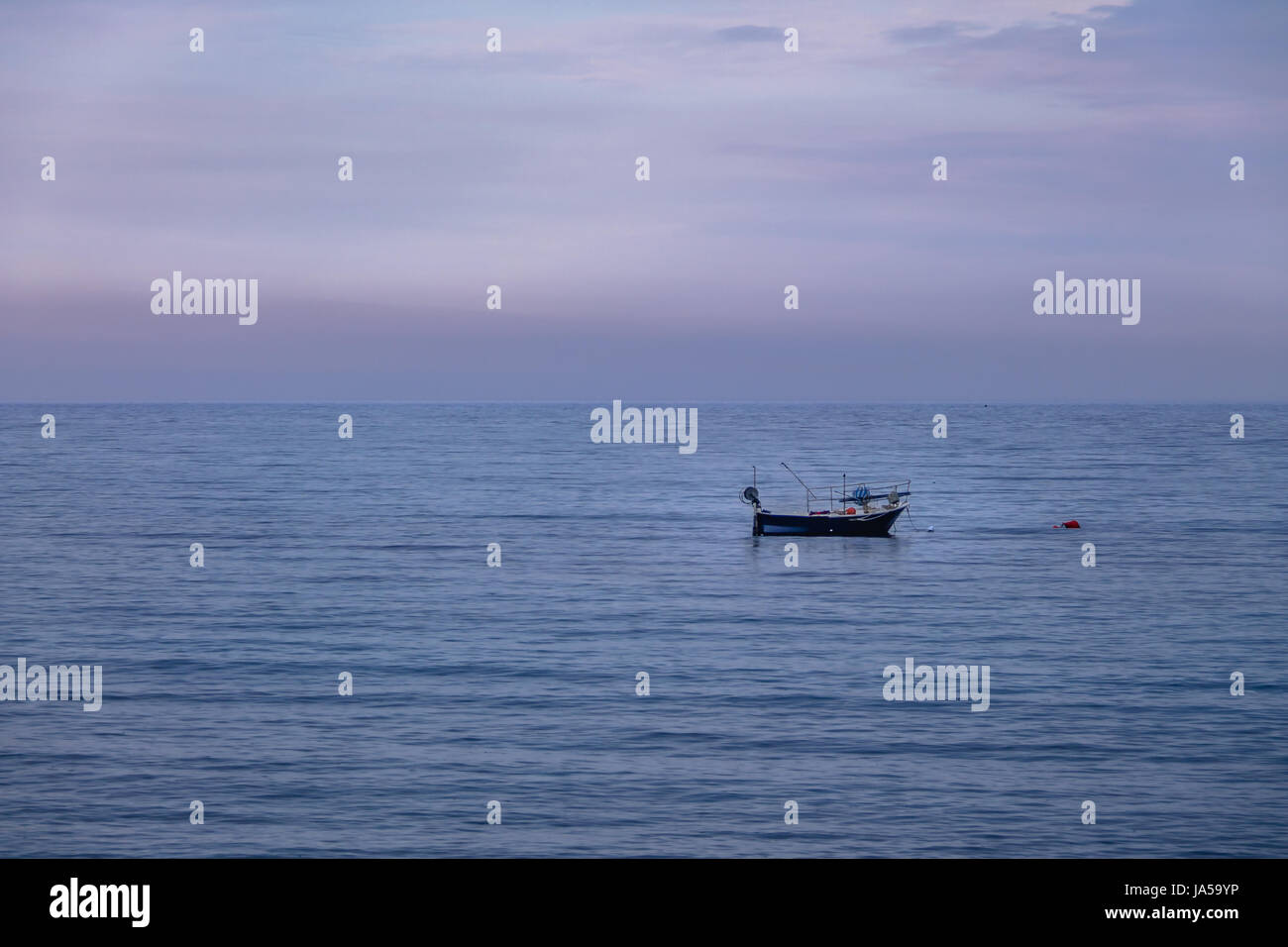 Beach beauty boat sunset hi-res stock photography and images - Alamy