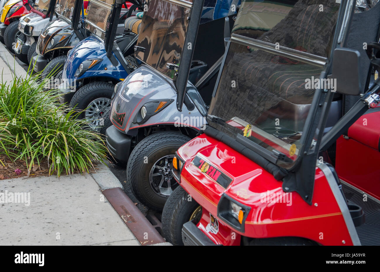 The Villages Florida retirement community with golf carts lined up in