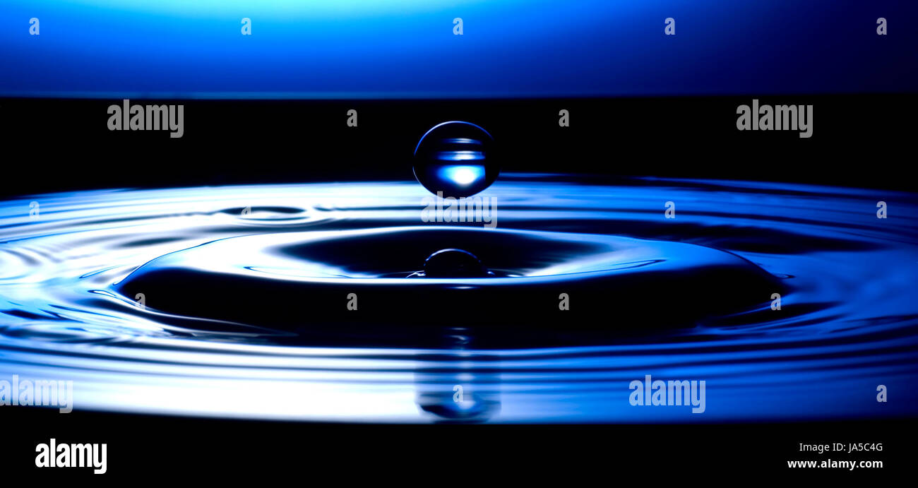 drop of water on blue background close up shoot Stock Photo - Alamy