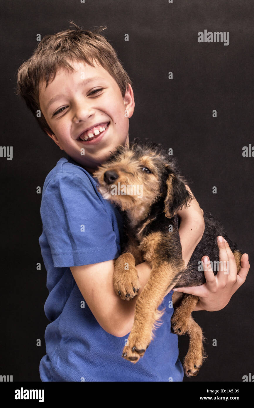 A boy portrait, young little cute and adorable man, little obstreperous scamp. Stock Photo