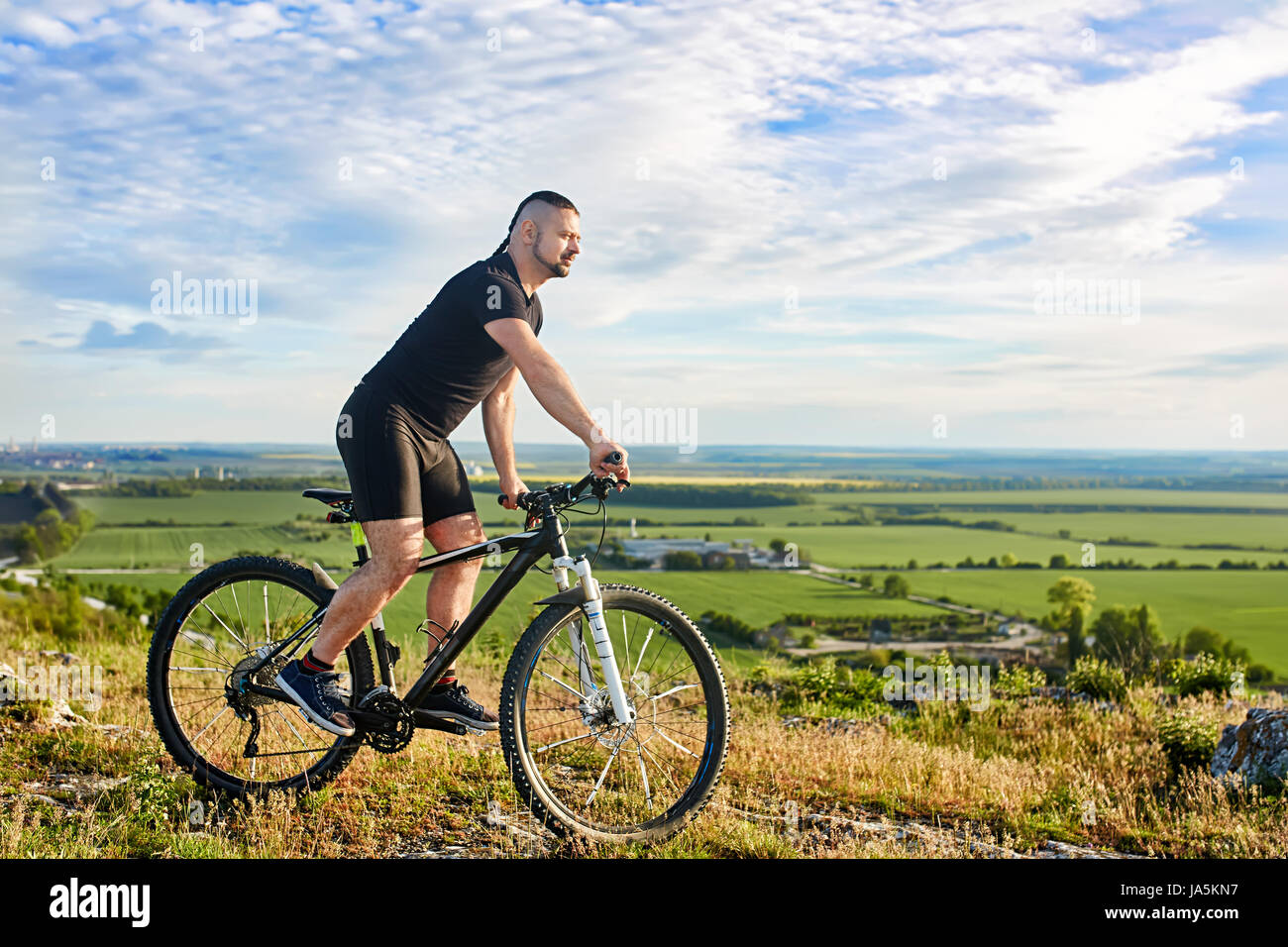 Bicycle Rideing Riding bike ride bicycle male outside bikers summer hi-res stock ...