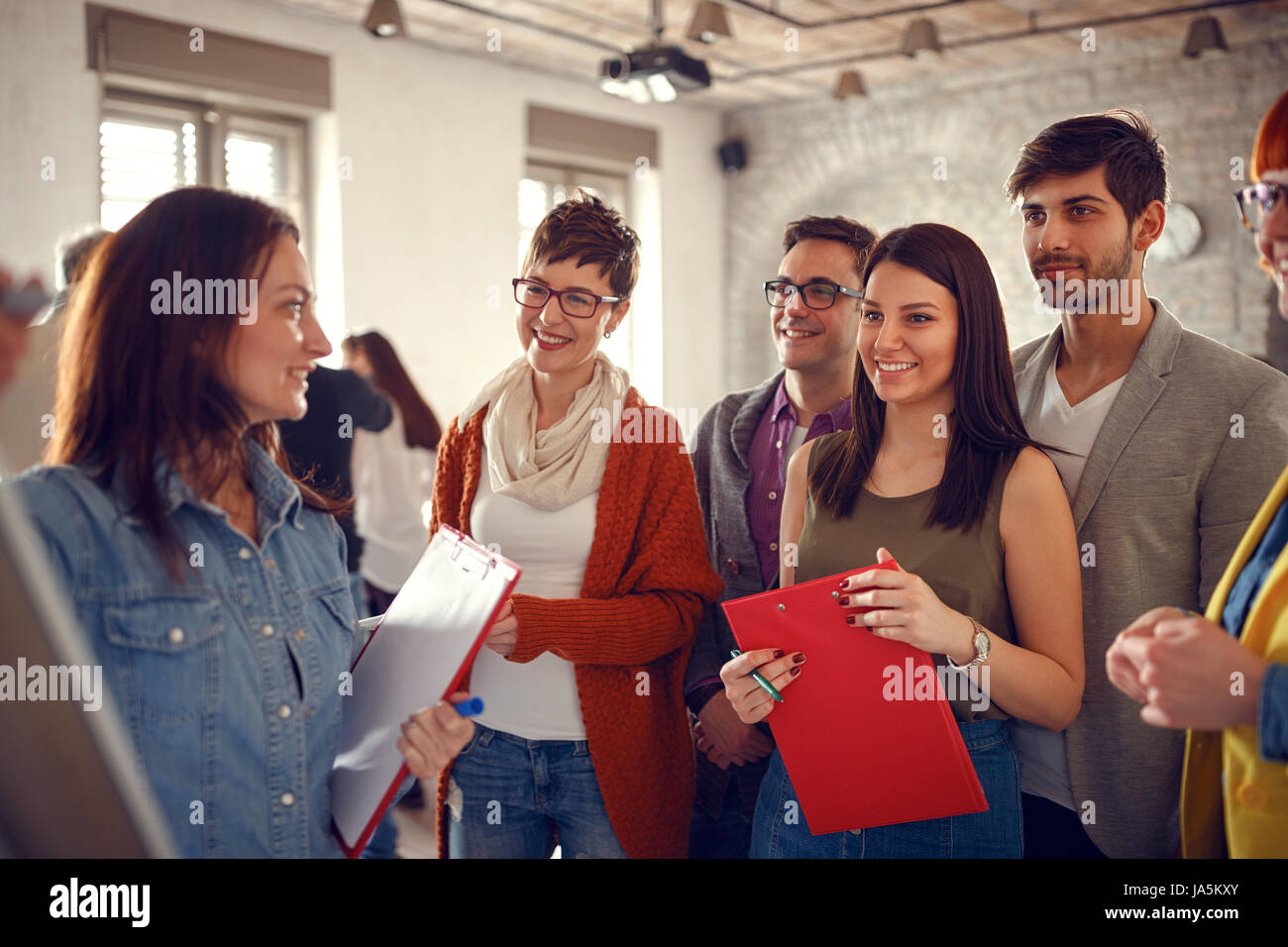 Creative business young people meeting in office Stock Photo - Alamy