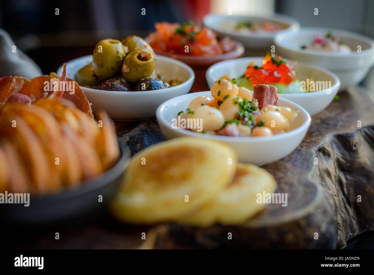 Aperitif Bites and tapas on small plates starters Stock Photo Alamy