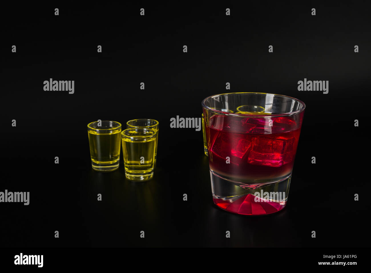 Set of green shots, green kamikaze, black background, party set, mix