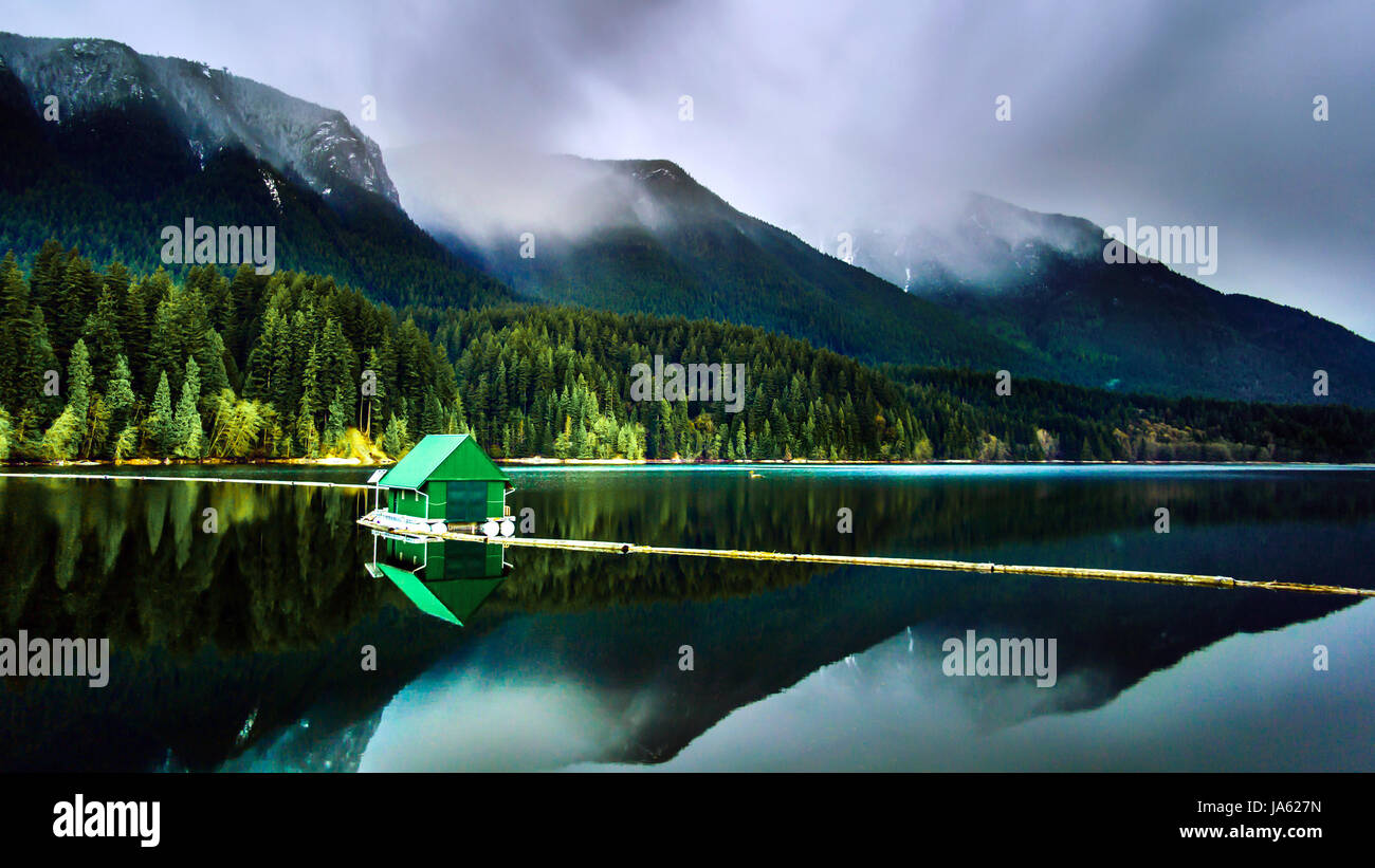 Green house on lake Stock Photo