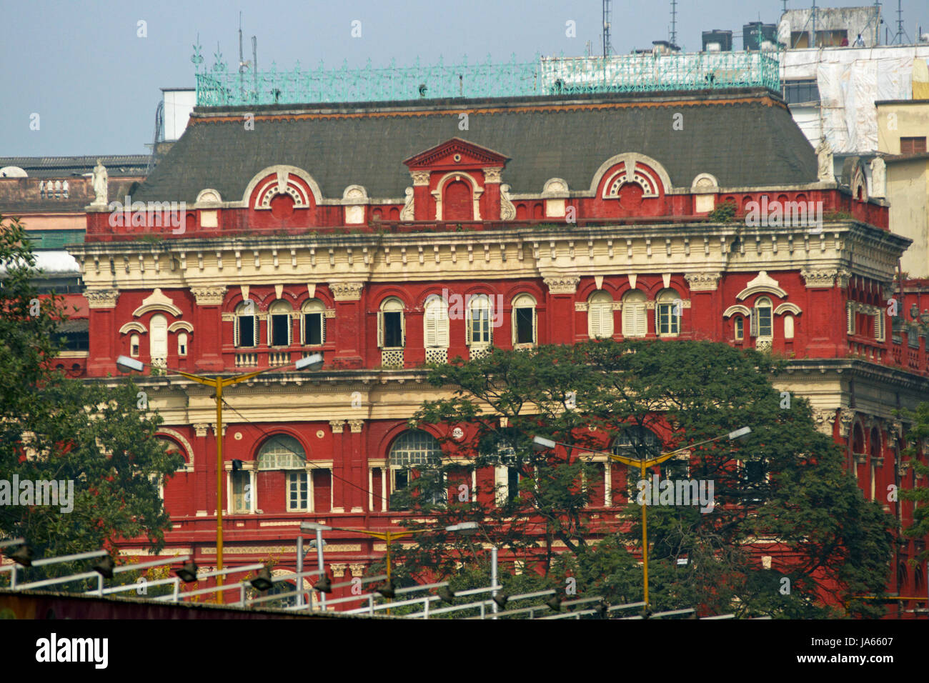 Colonial style building in central Calcutta, India. Ornate red building originally built by the British East India company. Now government offices. Stock Photo