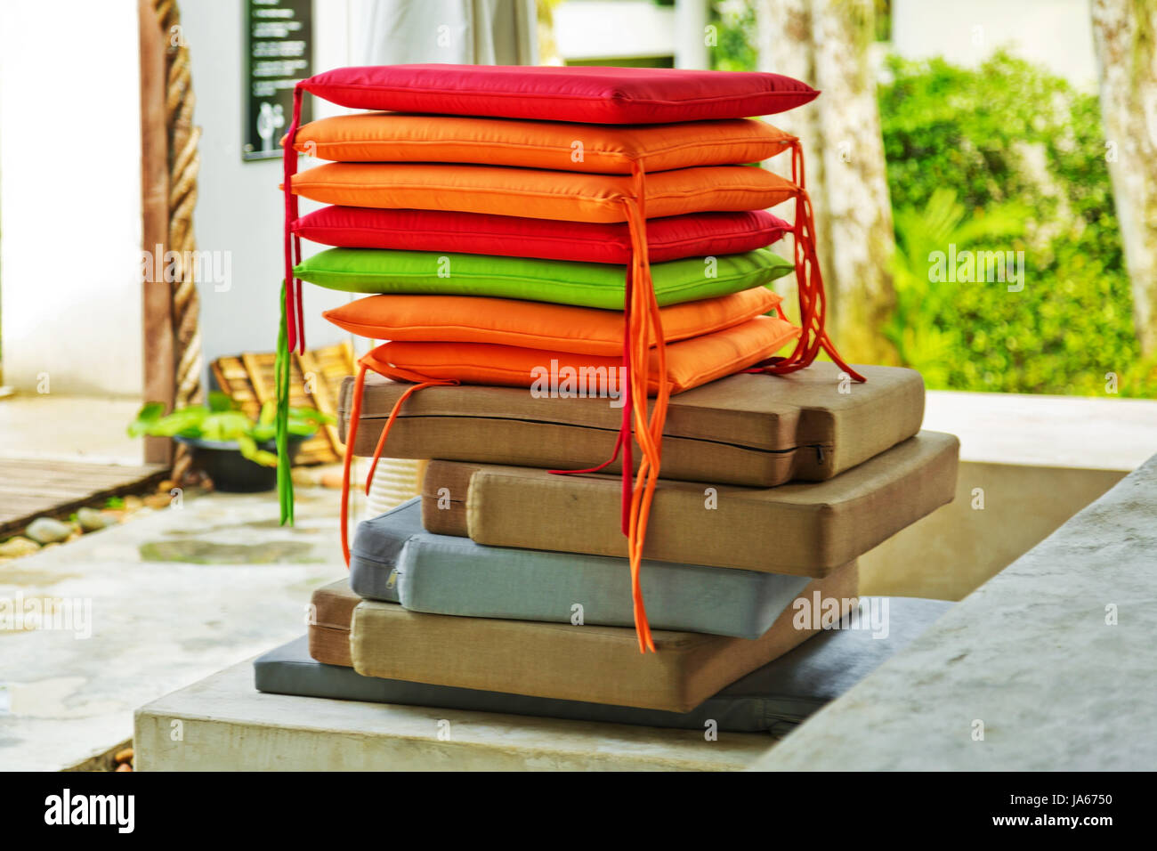 pile of colorful decorative chair pillows Stock Photo Alamy