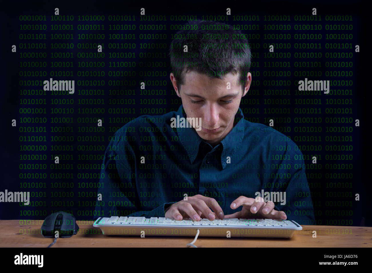 young man using the computer, programmer with lines of code Stock Photo ...