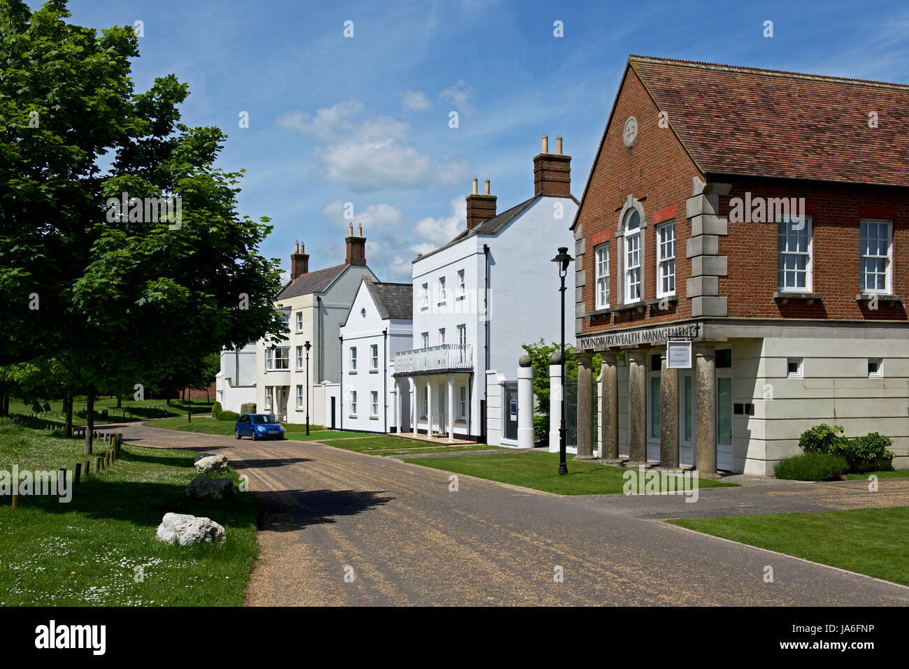 Houses on street in Poundbury, near Dorchester, Dorset, England UK