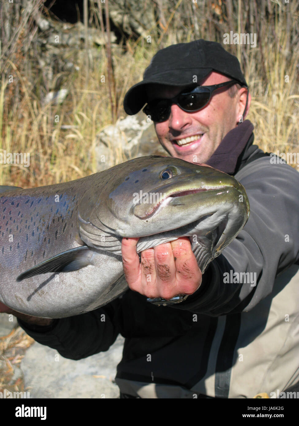 male masculine ruler angle fish fisherman angler laugh laughs laughing twit  Stock Photo - Alamy