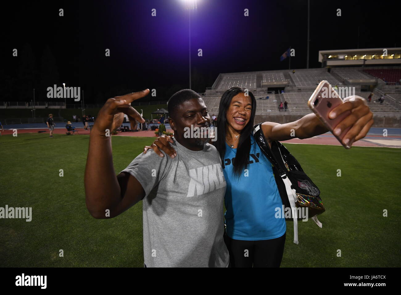 Long Beach Poly Jackrabbits sprints coach Doc Moye (left) poses with ...