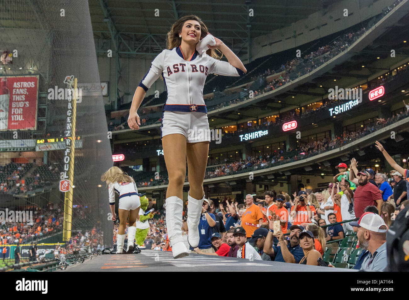 August 23, 2017: A member of the Houston Astros Shooting Stars gives away  t-shirts during a Major League Baseball game between the Houston Astros and  the Washington Nationals at Minute Maid Park