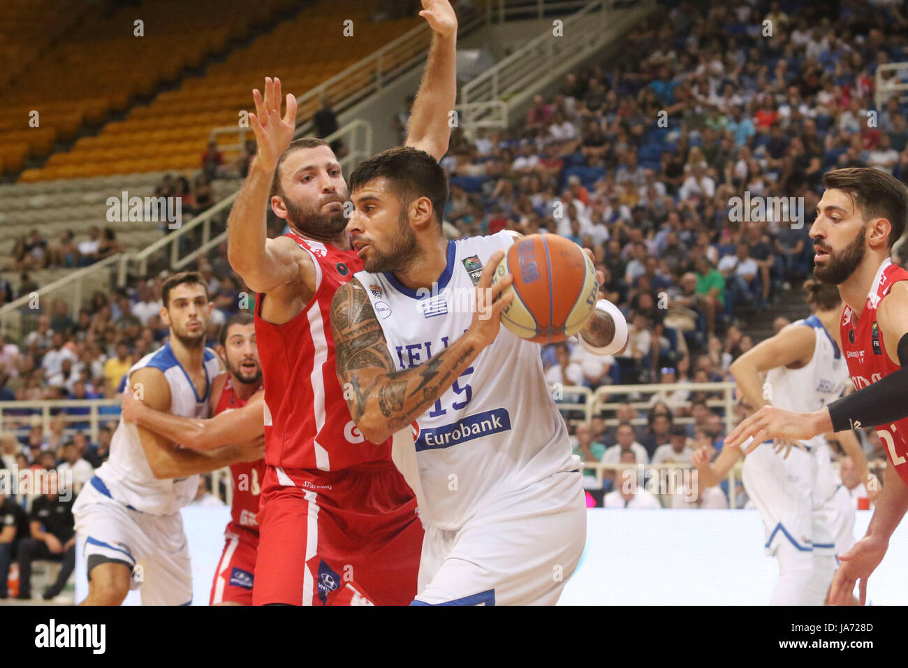 Athens, Greece. 23rd Aug, 2017. Greece's Yiorgos Printezis, center, at the Acropolis basketball tournament at the indoor Olympic stadium of Athens Georgia beats Greece 72-71 during the group stage match of the Acropolis International Basketball Tournament. Credit: SOPA Images Limited/Alamy Live News Stock Photo
