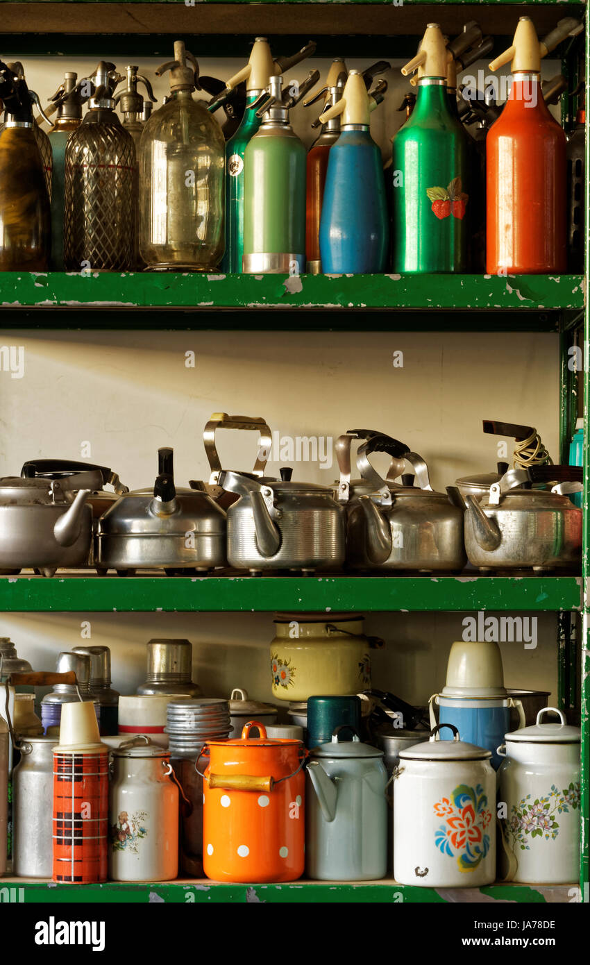 Photo of old household items, cans, electric kettles, siphons Stock Photo