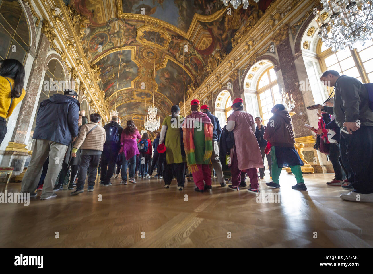 Tourist crowds in the Hall of Mirrors in Versailles palace Stock Photo