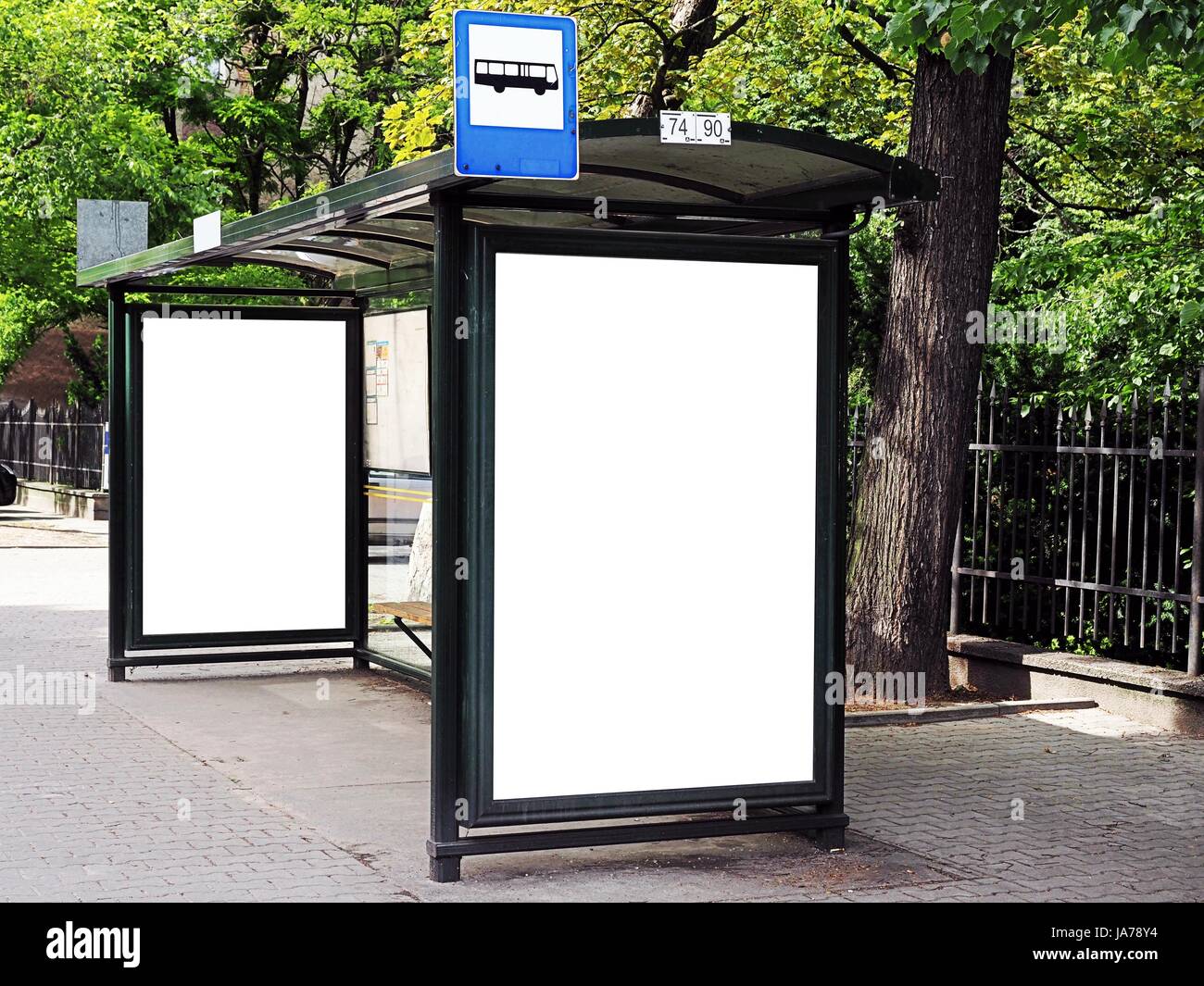 Bus tram stop, shelter, white empty place for street ads, advertisement board, mock up, mockup, signage Stock Photo