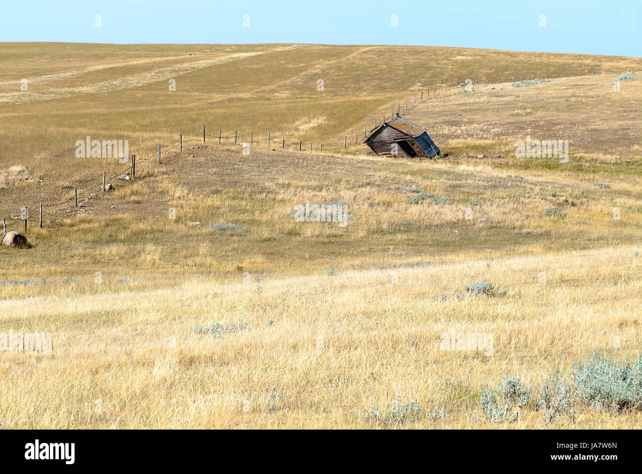 Abandoned shed in rolling hills Stock Photo