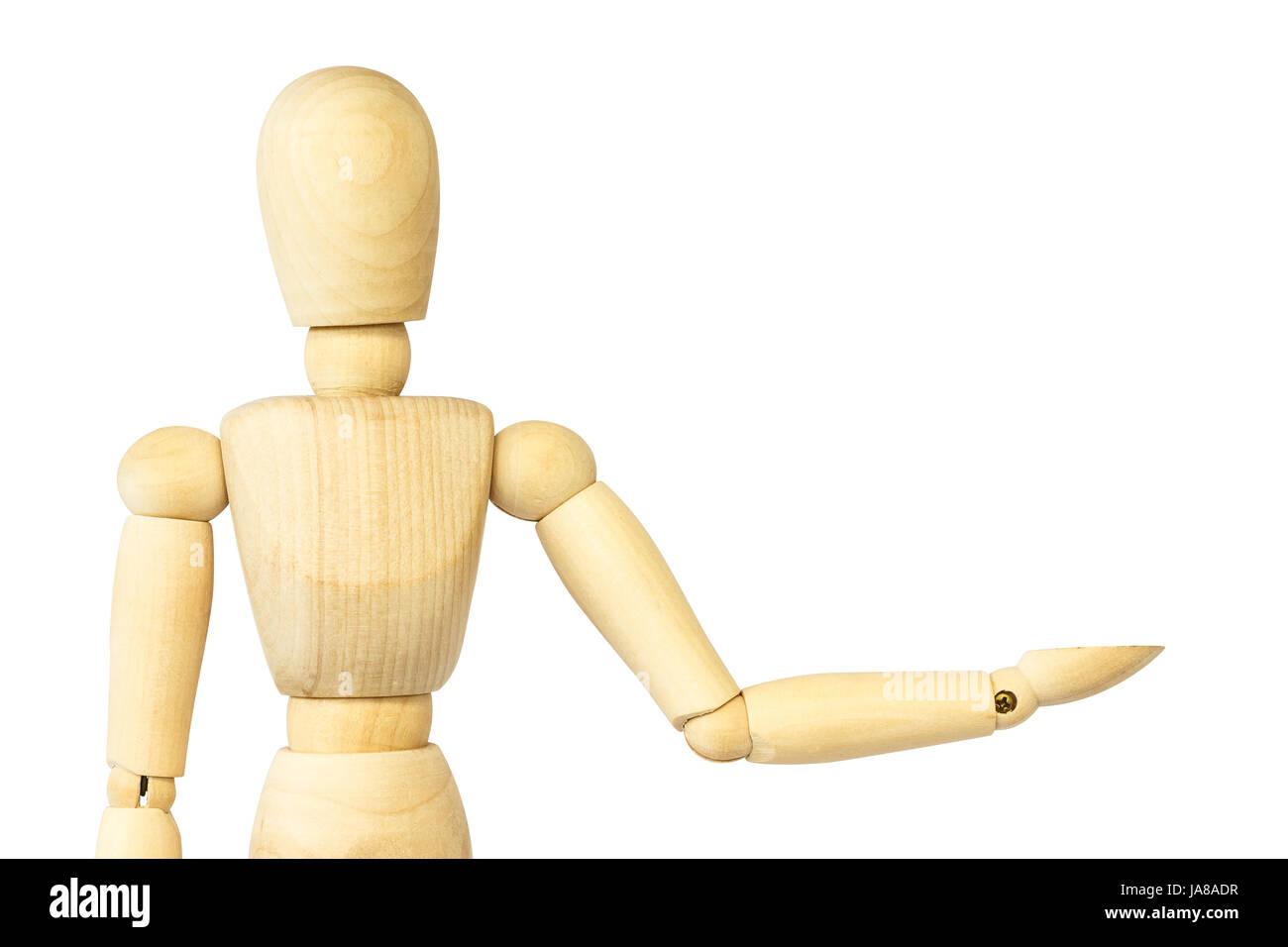 Wooden puppet is presenting something . Blank area at left side for fill your product . Isolated background . Stock Photo
