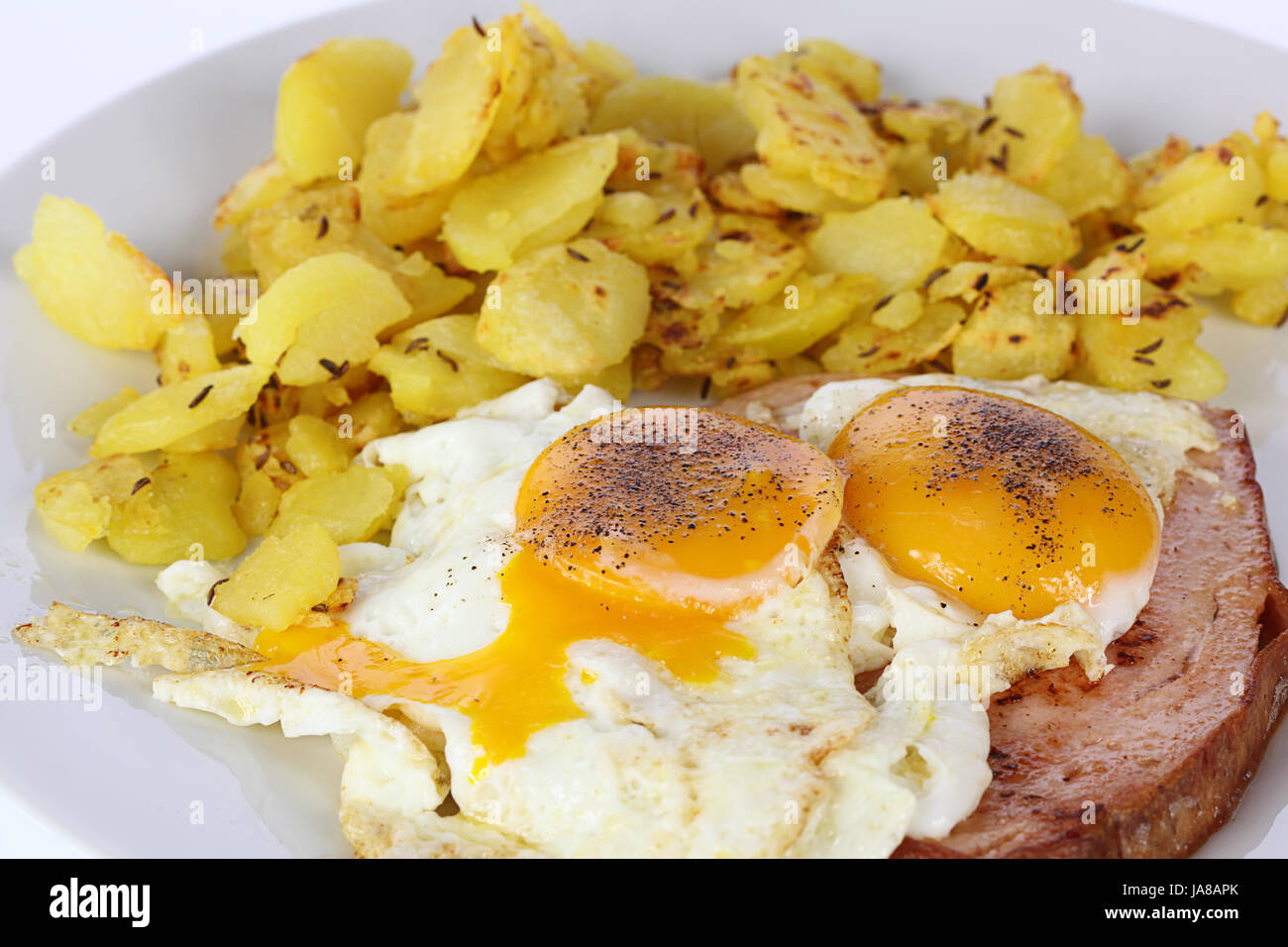 meatloaf with fried egg and fried potatoes Stock Photo Alamy