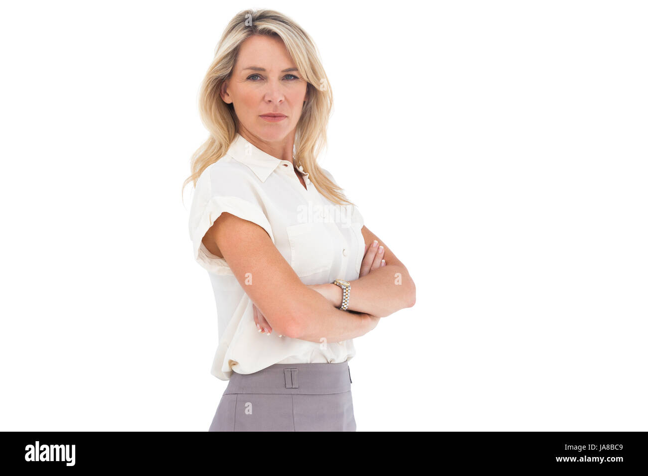 Stern looking woman arms crossed hi-res stock photography and images ...