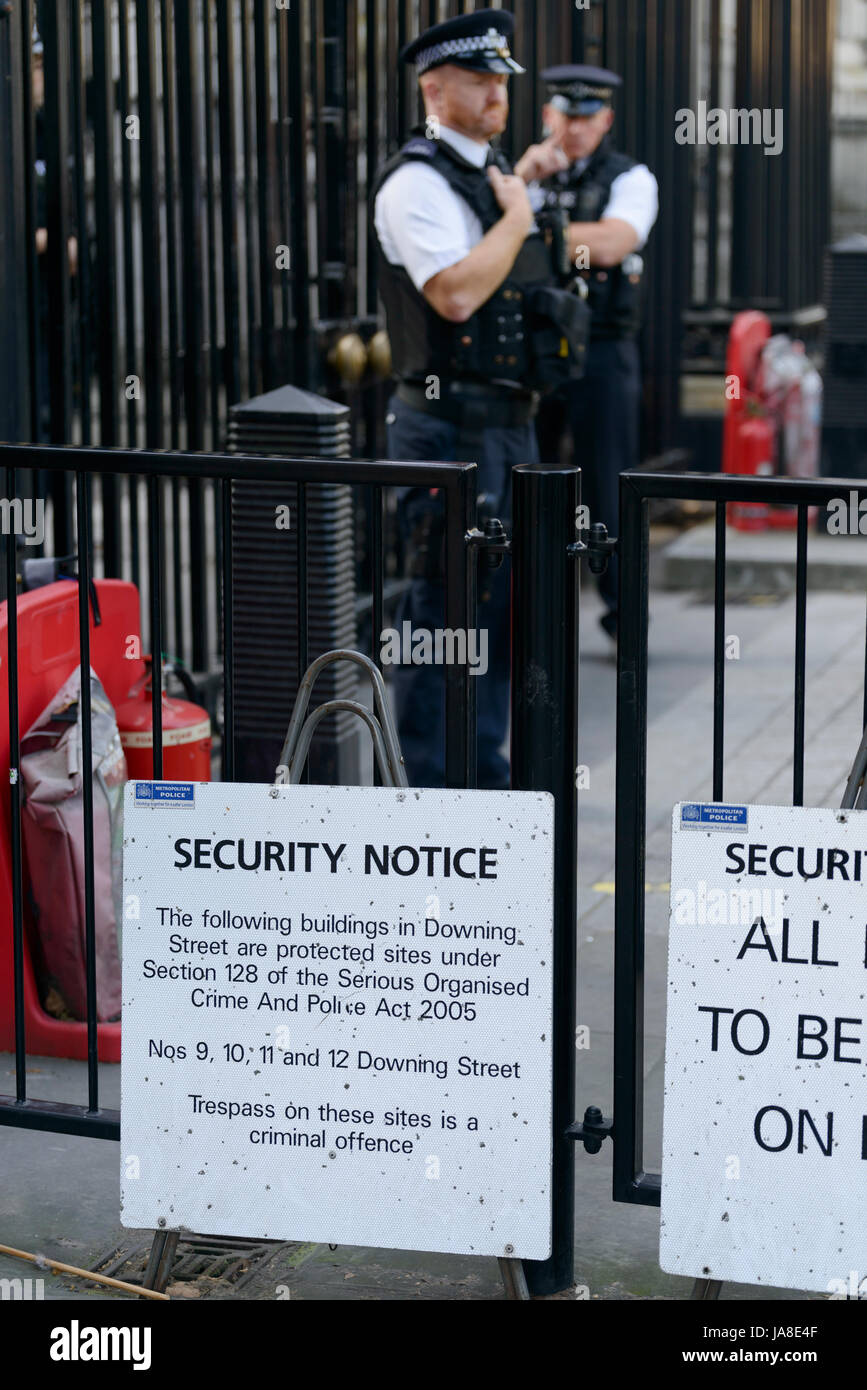 Westminster, London, UK - September 11, 2015: Security notice outside the well guarded entrance to Downing Street in London. Stock Photo