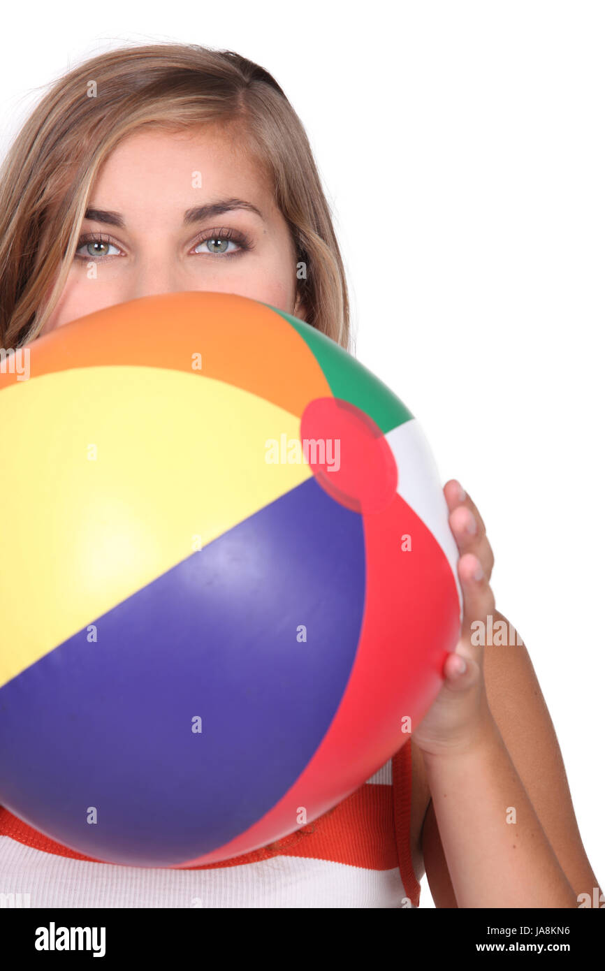 Woman lifting beach ball hi-res stock photography and images - Alamy