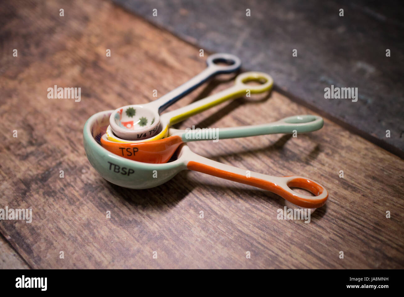 Ceramic measure spoons hi-res stock photography and images - Alamy