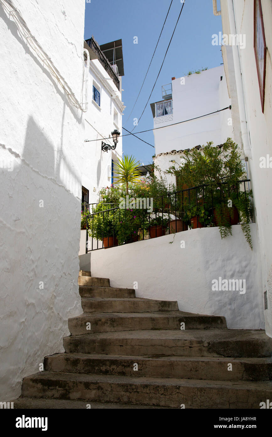 A steep street in Competa, Andalusia, Spain, Costa del Sol Stock Photo ...