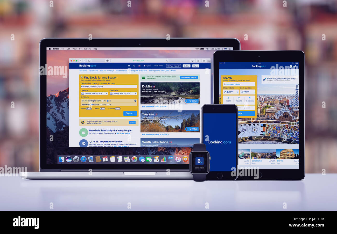 Booking.com on the Apple iPhone 7 iPad Pro Apple Watch and Macbook Pro Stock Photo
