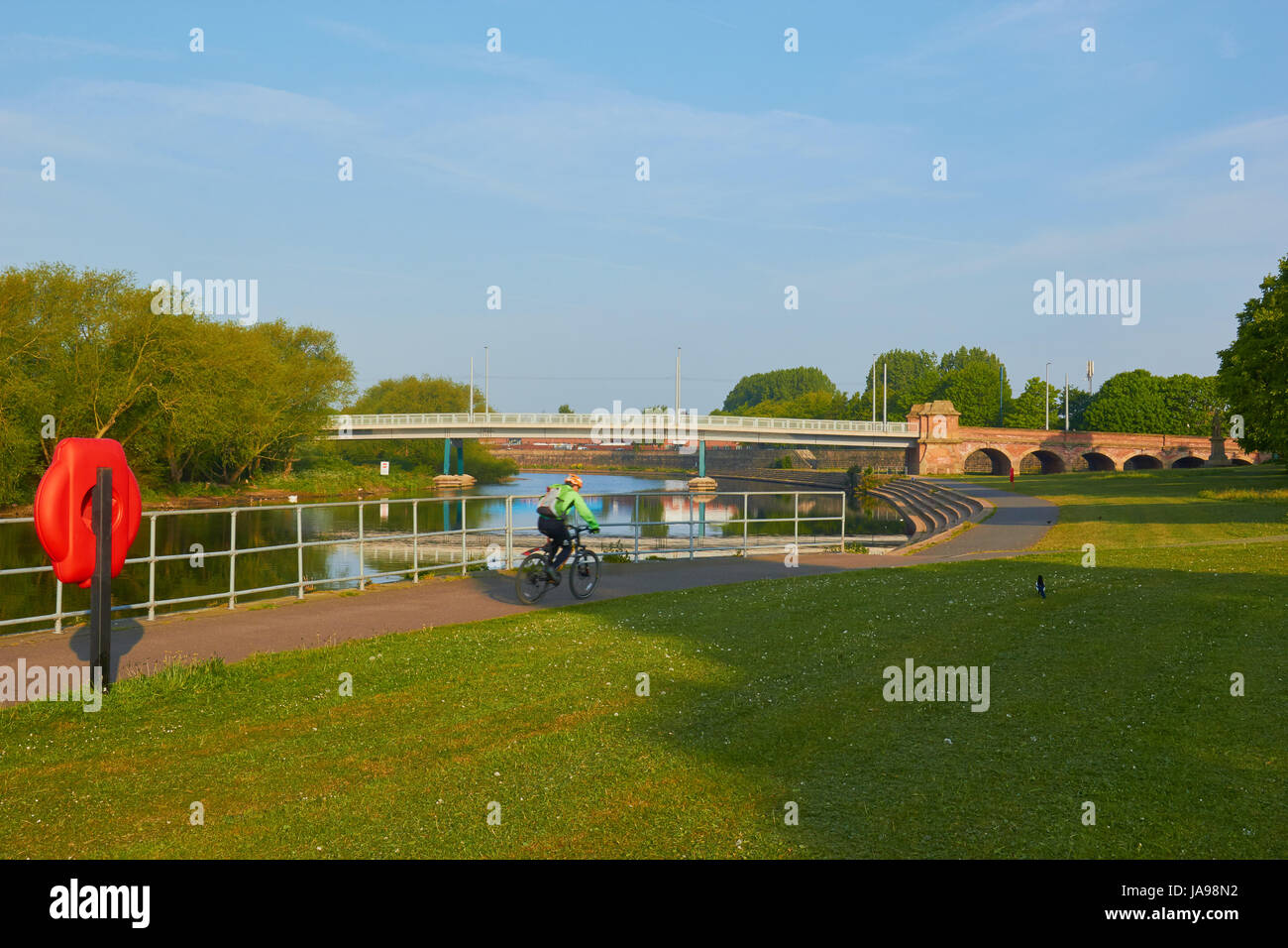 Willard Toll Bridge over the river Trent and cyclist, Nottingham, Nottinghamshire, east Midlands, England Stock Photo