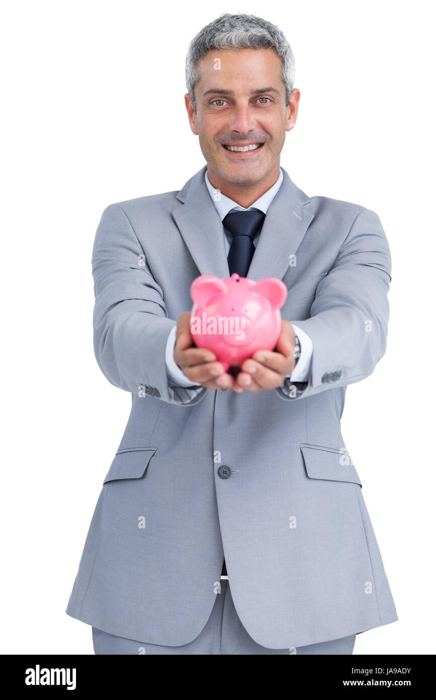 Joyful businessman on white background holding piggy bank Stock Photo ...