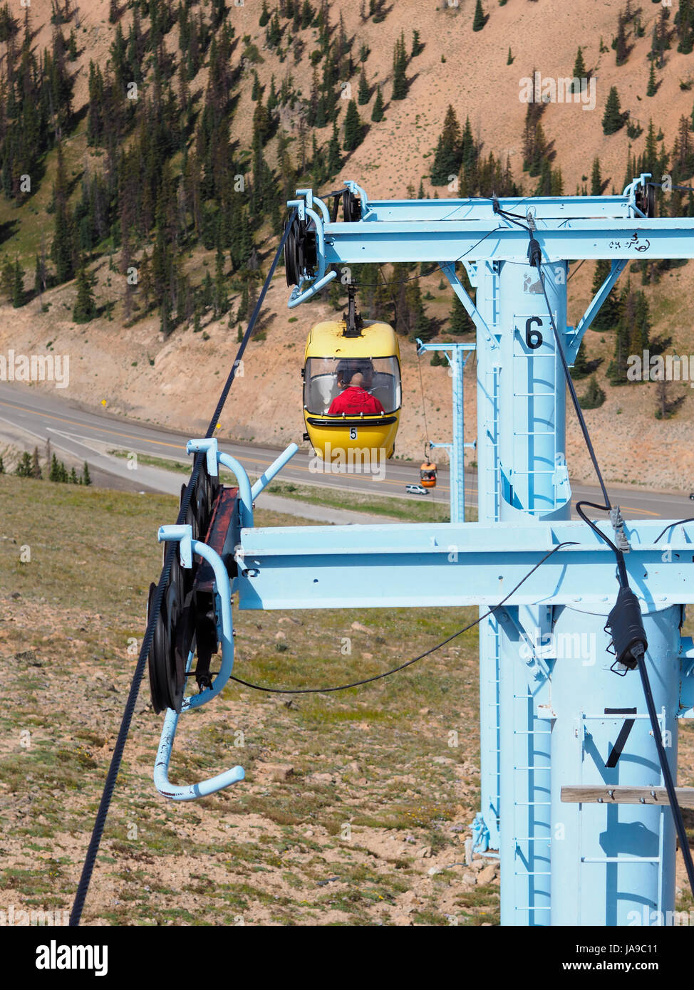 Touristic aerial tram / cable car leading up to Monarch Ridge, (elevation 12,000 ft/3700m) and the Continental Divide in the Colorado Rocky Mountains. Stock Photo