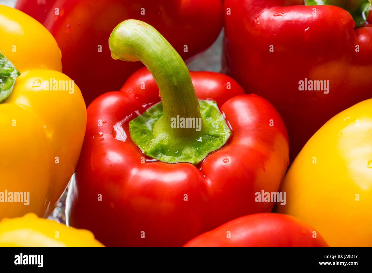 Fresh sweet yellow and red peppers. Vegetables macro Stock Photo - Alamy