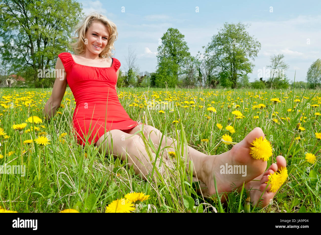 happy woman on a meadow Stock Photo