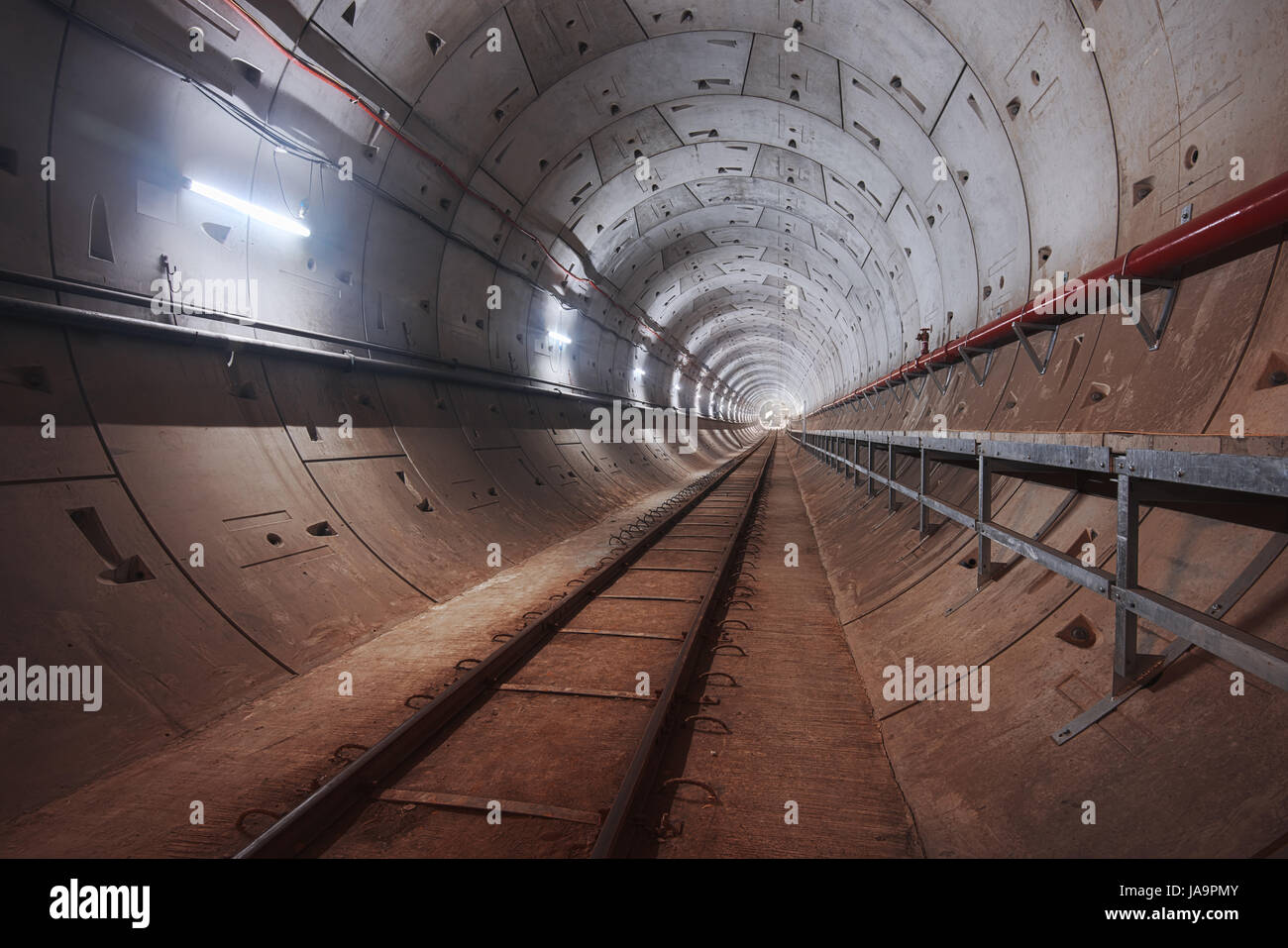 Construction of subway tunnel with white light in the modern city Stock Photo