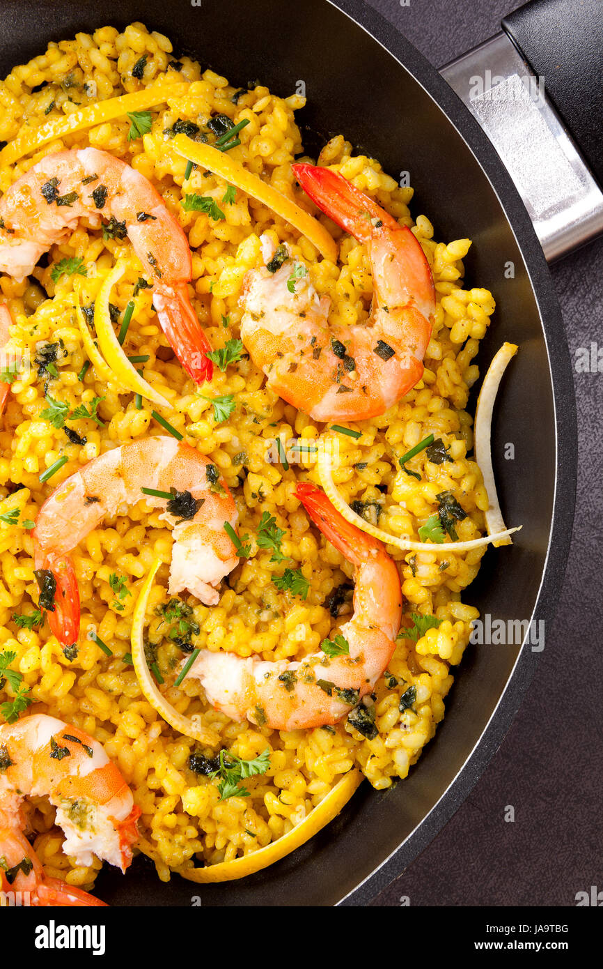 Delicious paella in pan from above Stock Photo Alamy