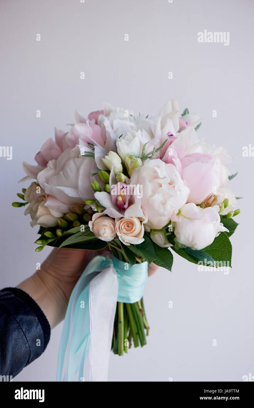 The bride's bouquet of soft pink peonies and white roses . Wedding ...