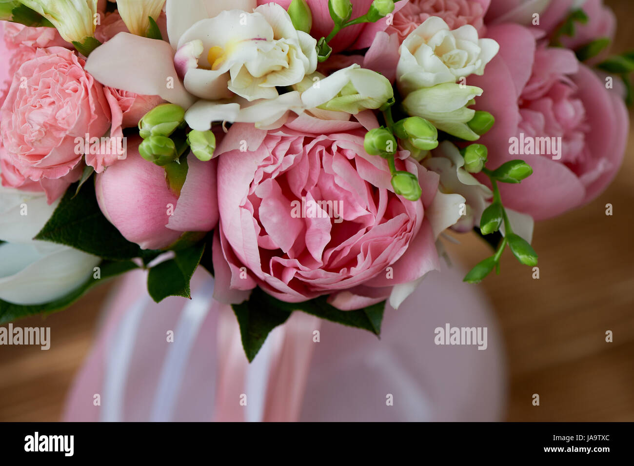 The bride's bouquet of soft pink peonies and white roses . Wedding ...