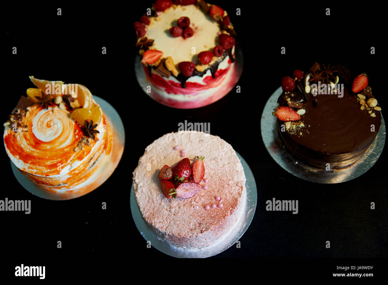 The different cakes smoothly rotate on the base.There is chocolate ...