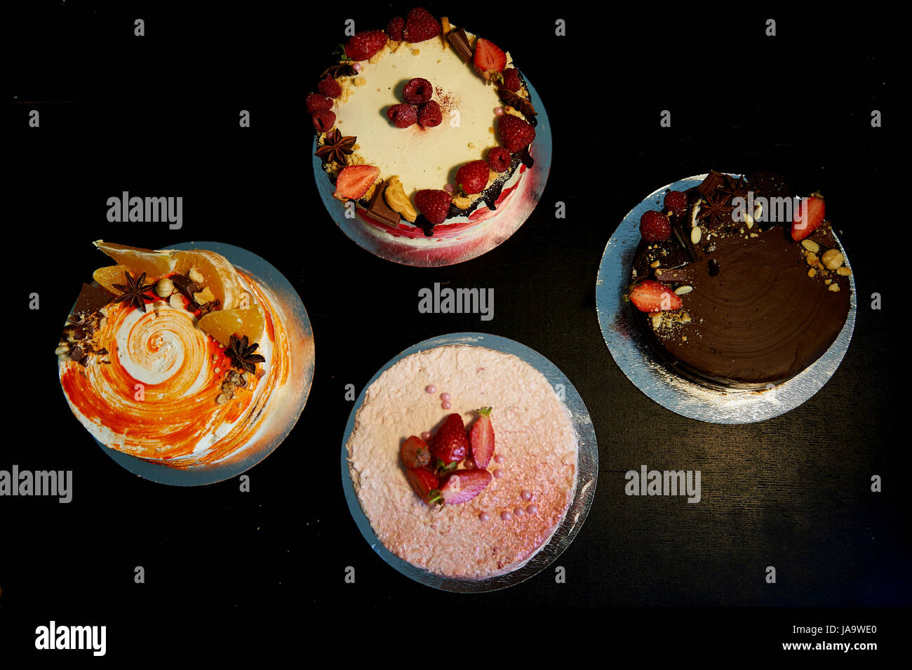 The different cakes smoothly rotate on the base.There is chocolate ...