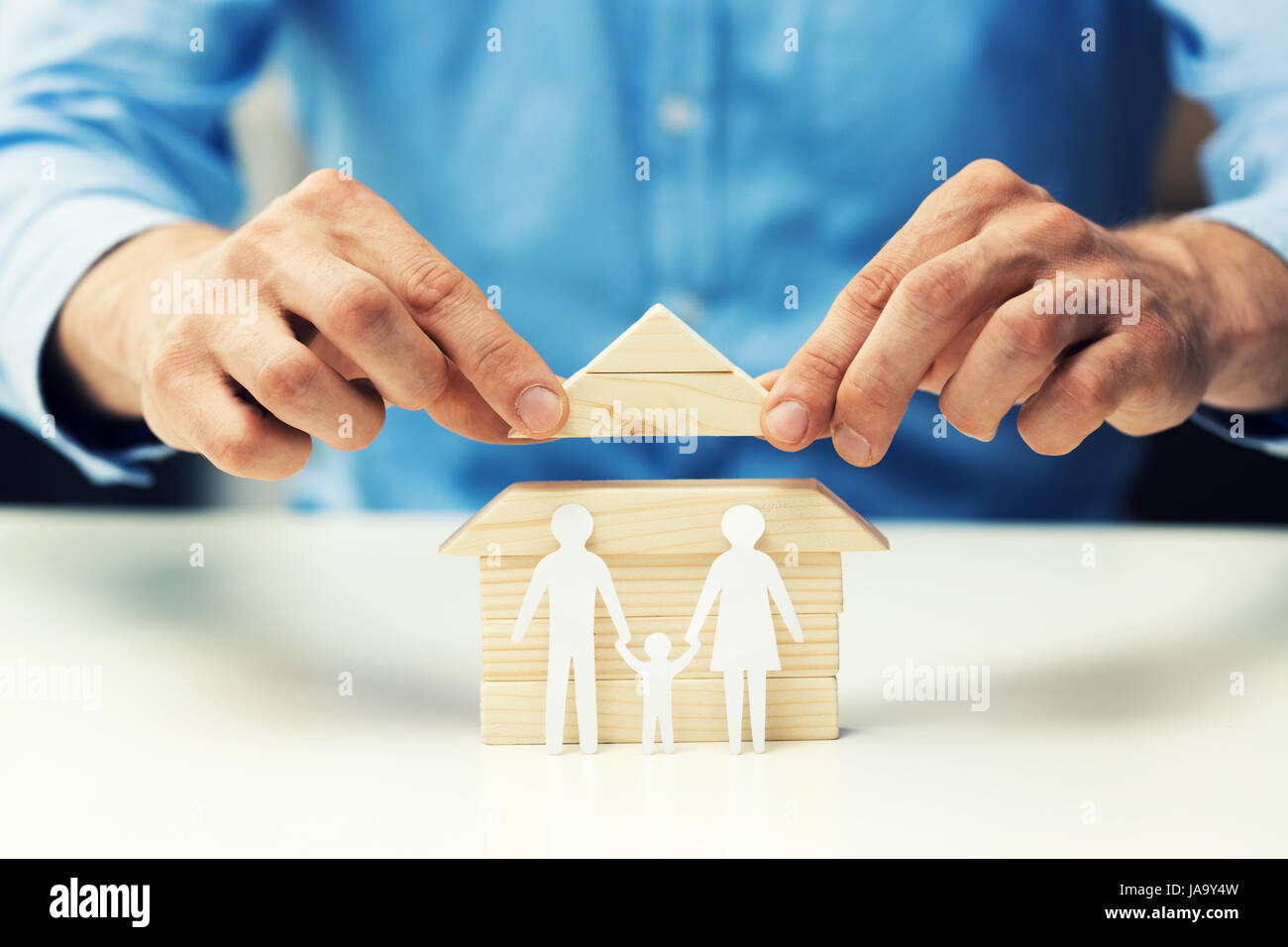 house mortgage concept - bank salesman help family to get new home Stock Photo