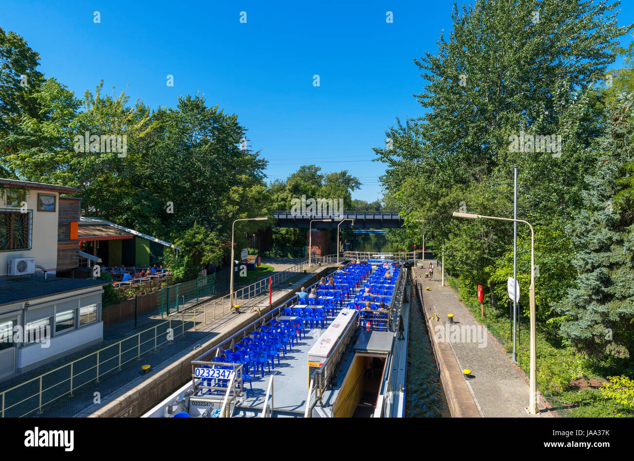 River cruise boat in a lock on the Landwehr Canal, Tiergarten, Berlin, Germany Stock Photo