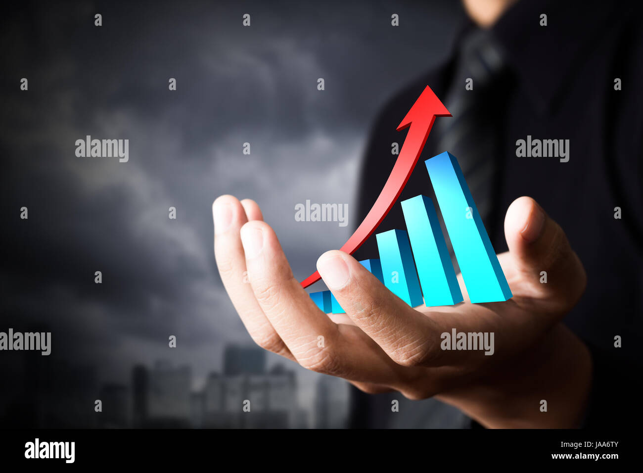 Hand holding a rising arrow, representing business growth Stock Photo ...