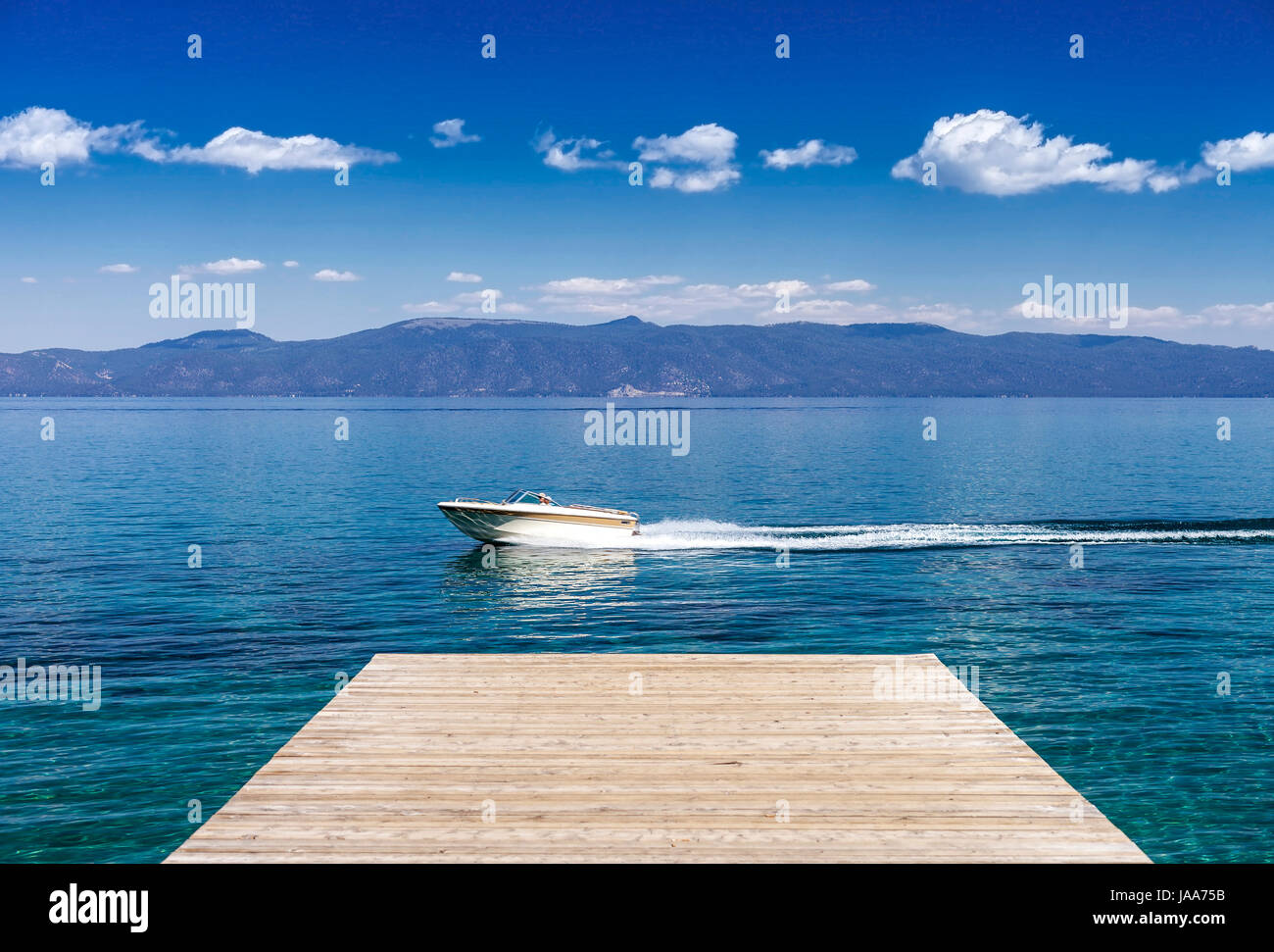 A family boating on Lake Tahoe near Sugar Pine Point during a summer afternoon. Stock Photo