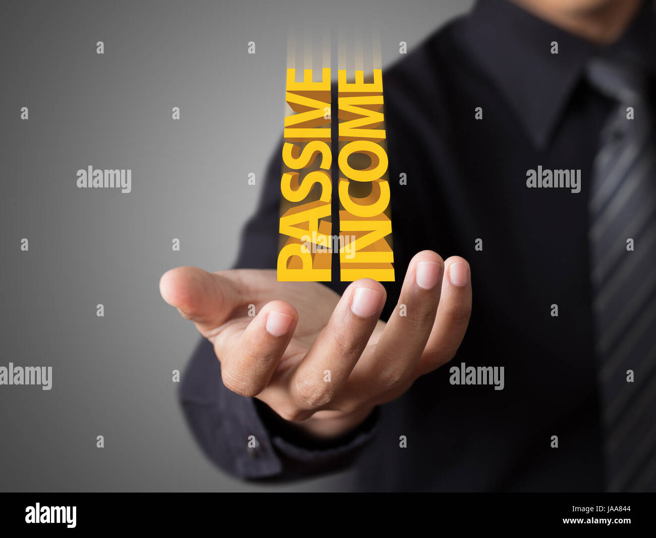 Businessman showing text passive income concept Stock Photo