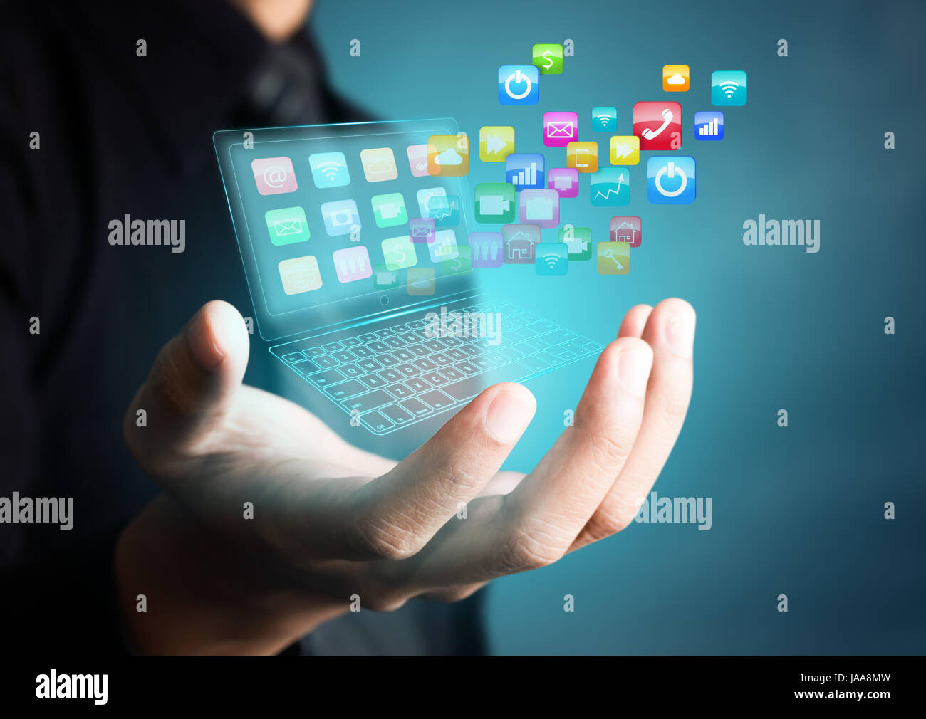 Touch screen tablet with cloud of colorful application icons Stock Photo