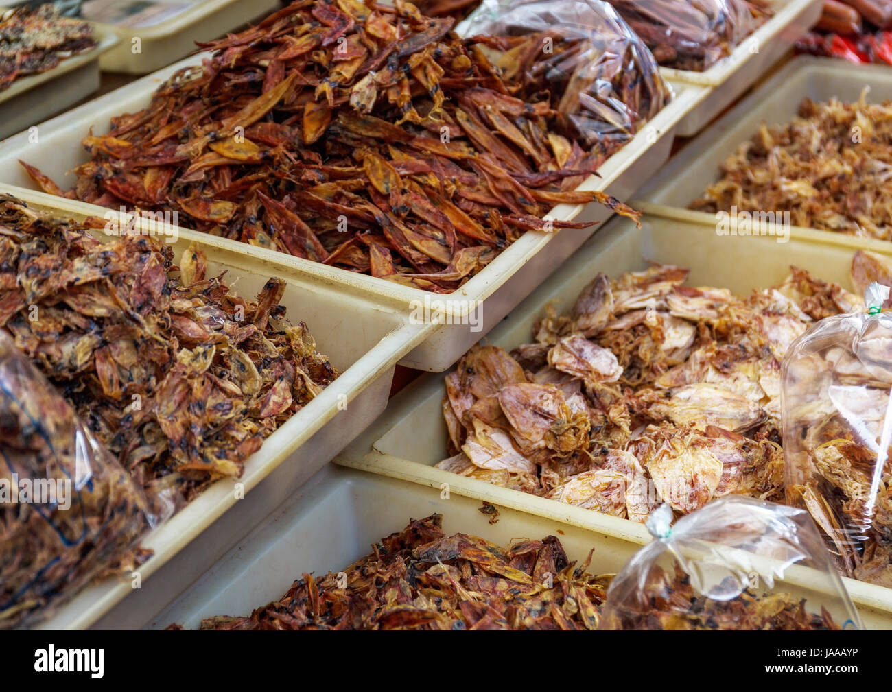 Dried squid in food market Stock Photo - Alamy
