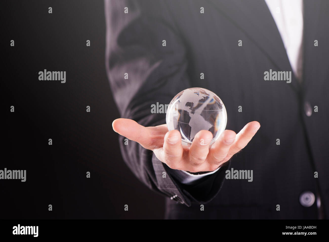 Hands holding up globe hi-res stock photography and images - Alamy