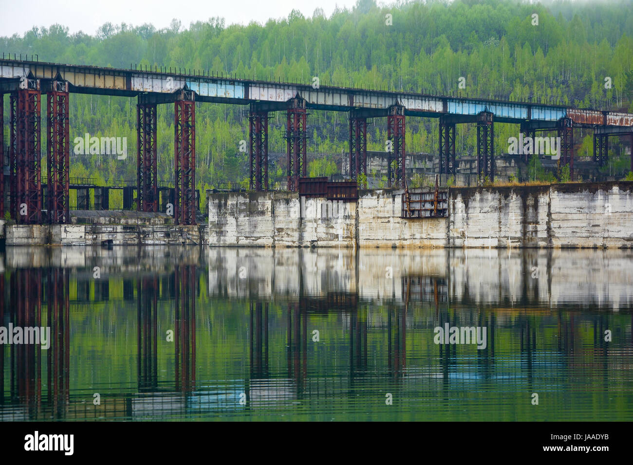 The unfinished dam krapivinsk hydrosystem on the river Tom. The village of Zelenogorsk, Kemerovo region. Construction stopped because of the protests  Stock Photo